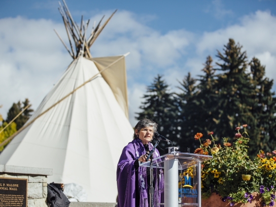 President Cruzado announcing a donation for the American Indian Hall.