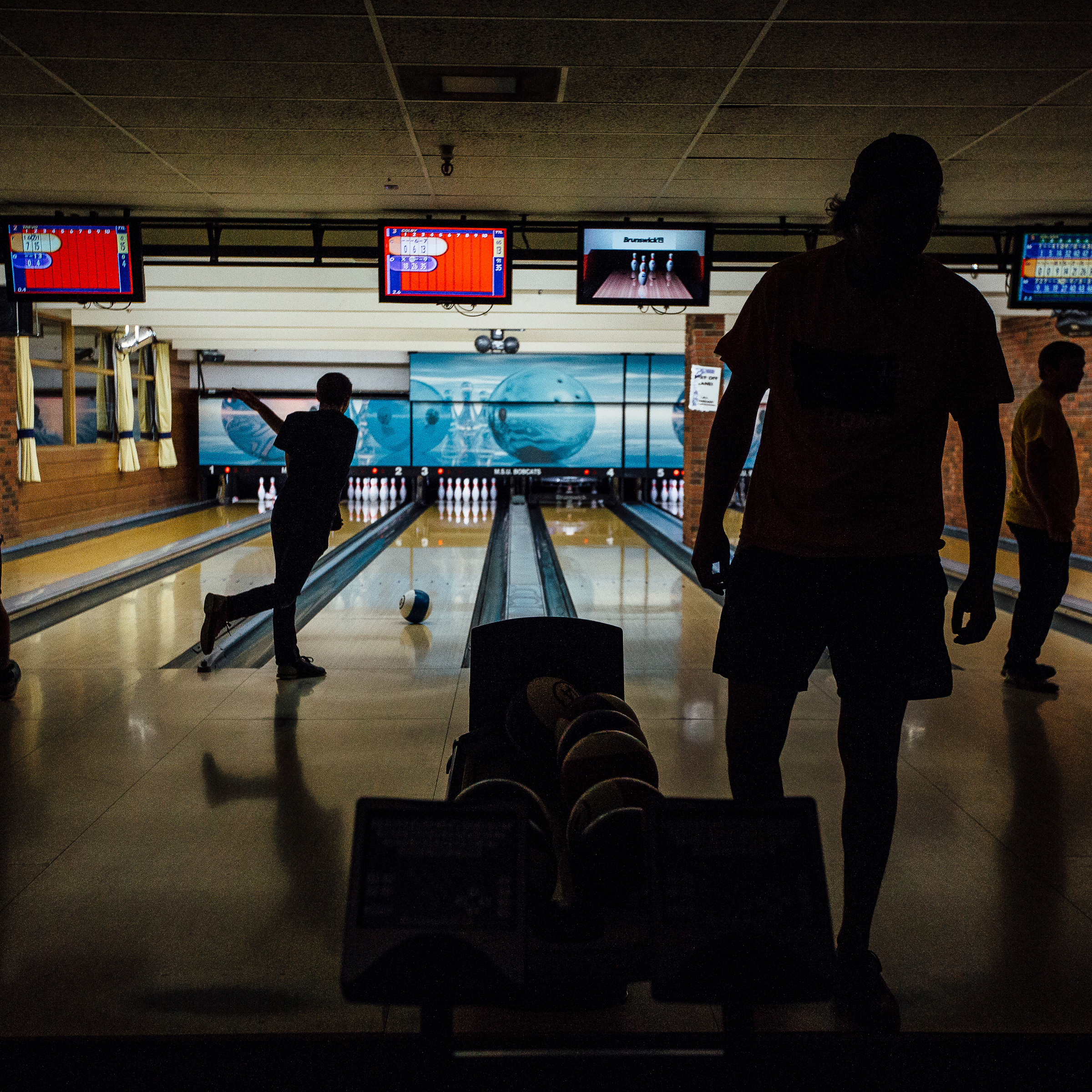 Students bowling.