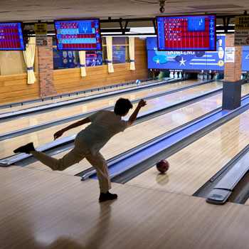 Students bowling.