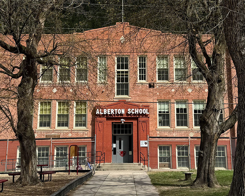 Front of a brick building with 'Alberton School' at the front