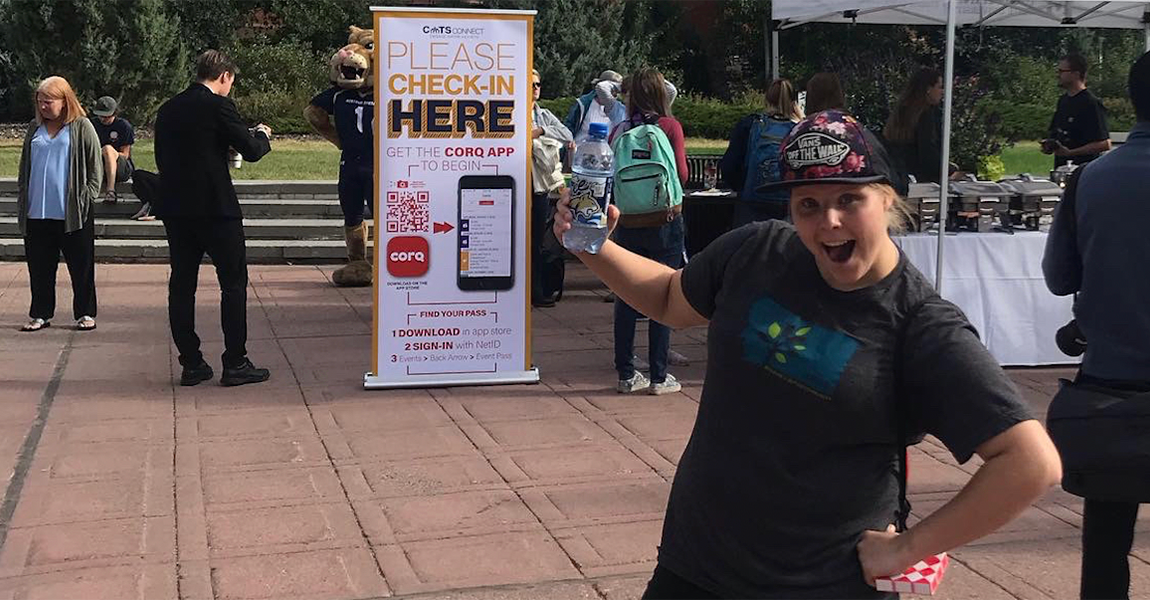 a LIFE scholars student posing with water