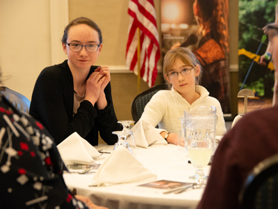Two 4-H members at the Legislative Breakfast