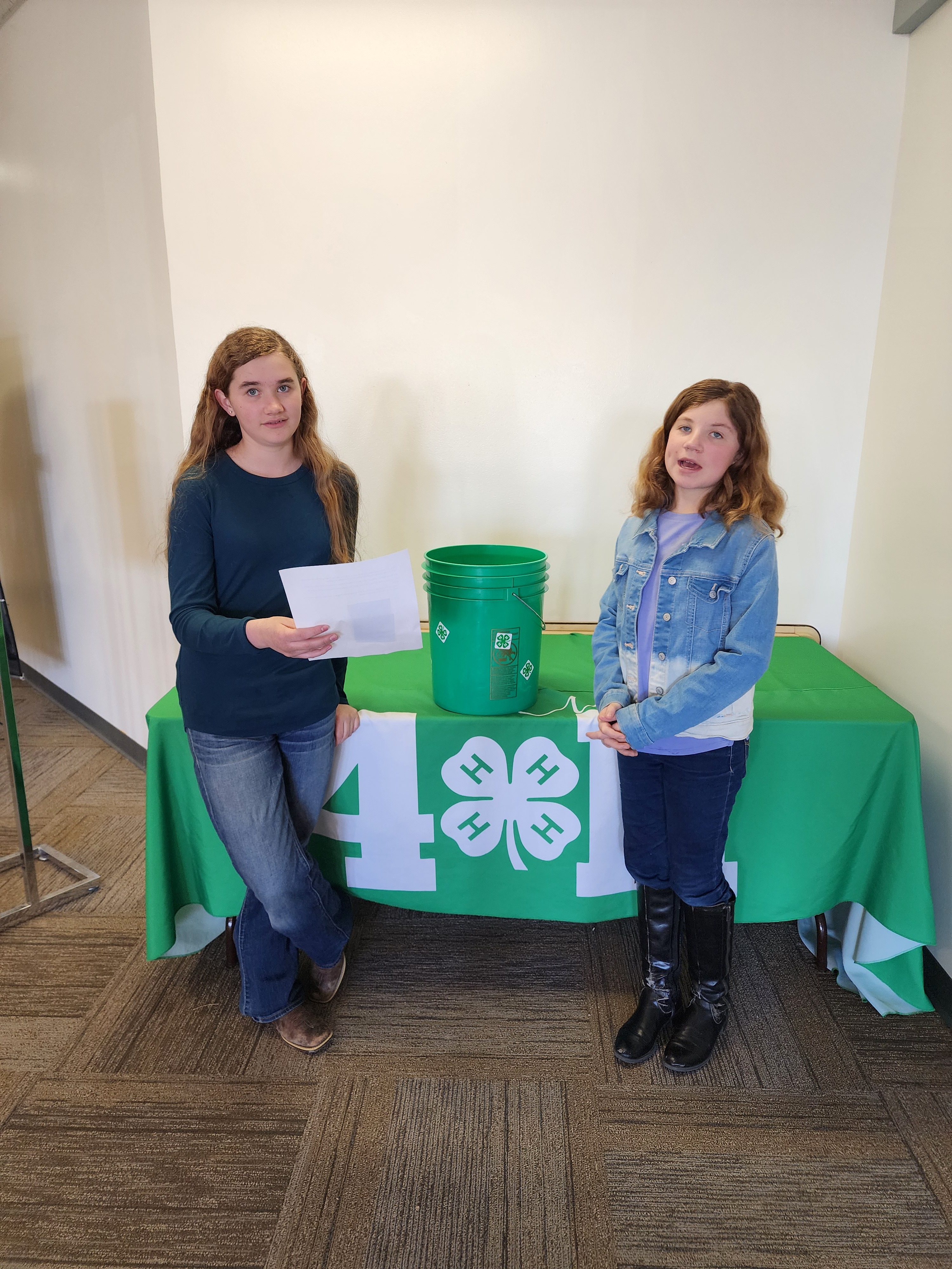 Girls drawing raffle tickets