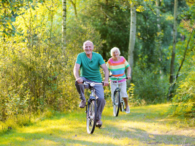 senior couple riding bikes