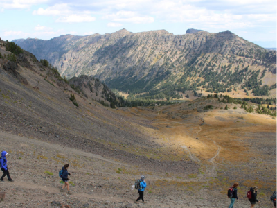 Hike & Read HONR 123 students decending Hyalite Peak.