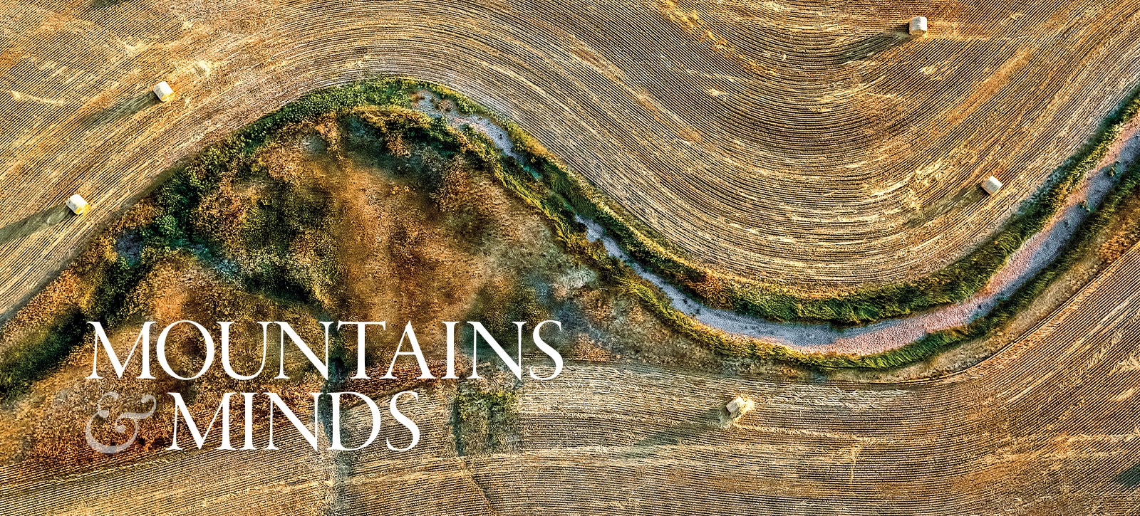 aerial view of creek bed and hay fields in eastern Montana