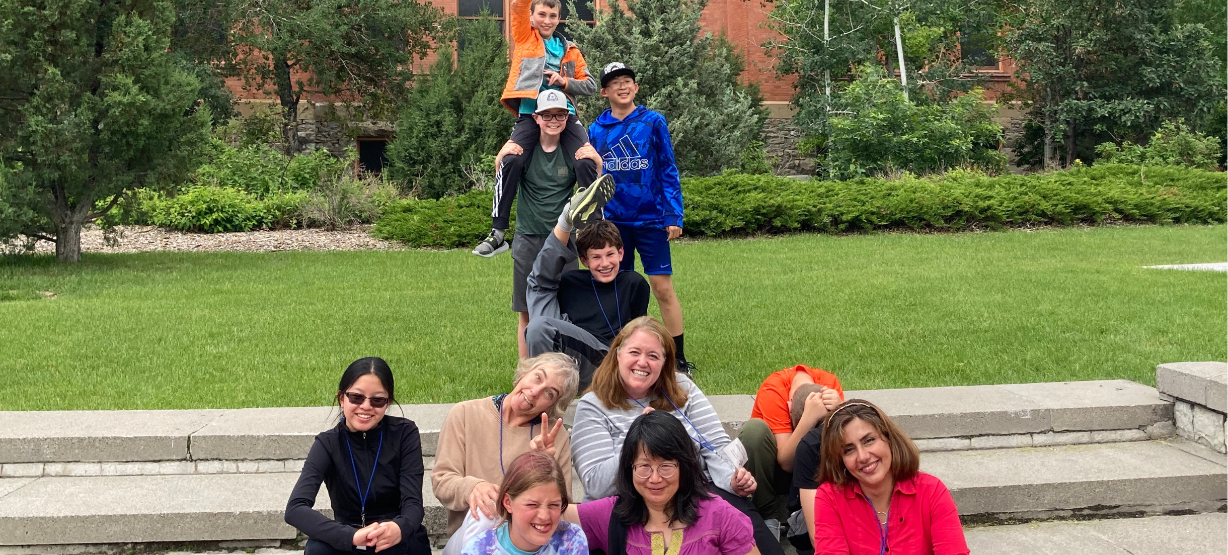 Math Circle students posing for a picture with instructors