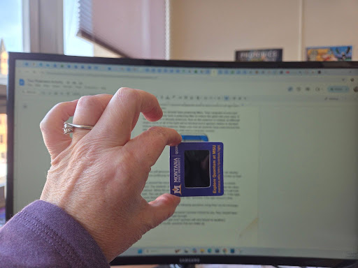 polarizer oriented so computer screen is not visible through it