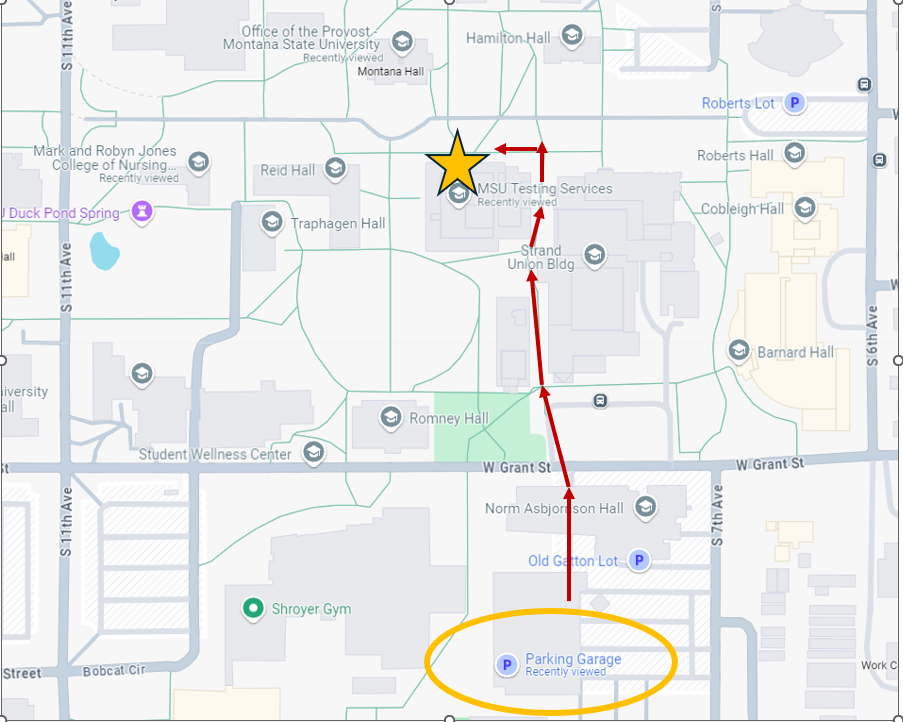 A screenshot of a map showing a section of the Montana State University campus. There is a yellow star marked on the map, located above the label MSU Testing Services. A red line starts from this star and suggests a route from the star to the parking garage.